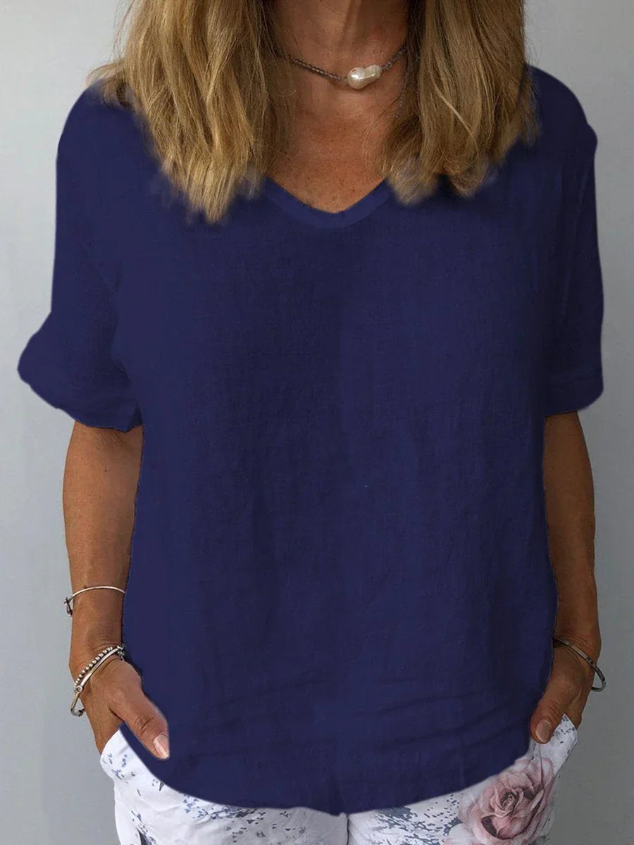 Women's relaxed fit V-neck short sleeve blouse, perfect for everyday casual comfort and style.