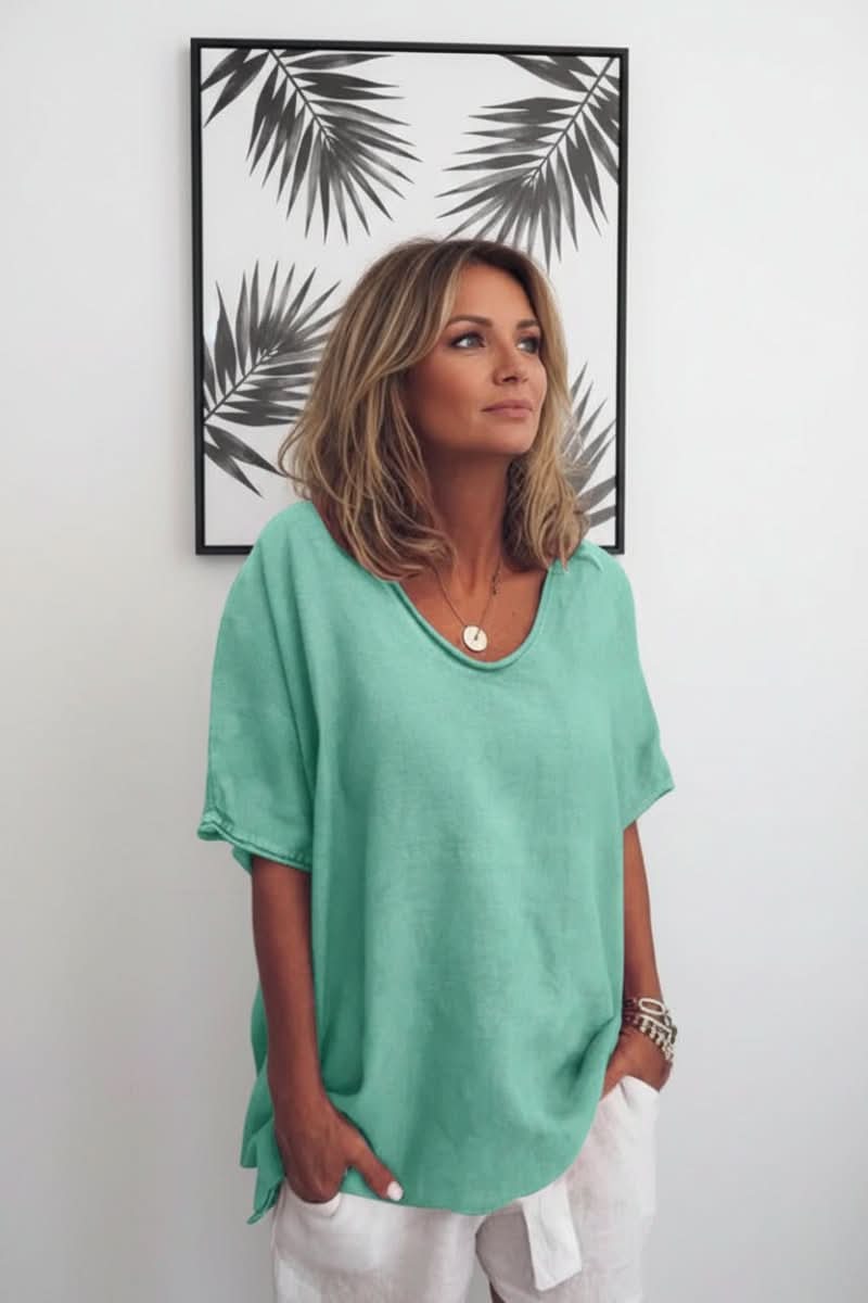 Breezy women's summer V-neck blouse with a relaxed fit for ultimate warm-weather comfort.