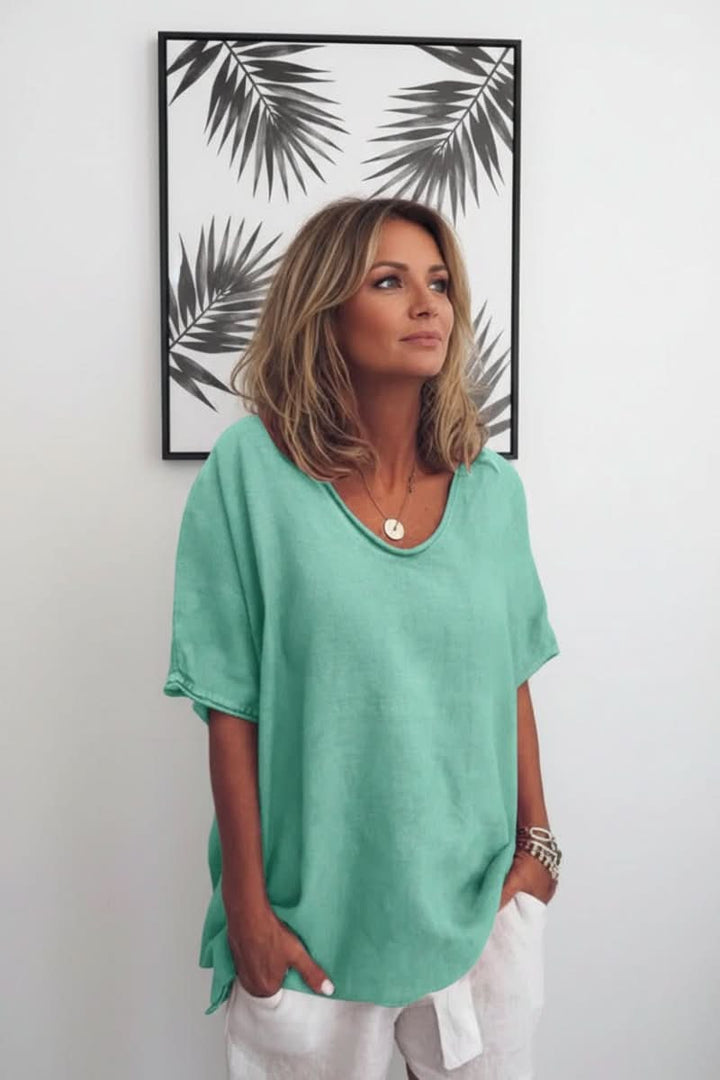Breezy women's summer V-neck blouse with a relaxed fit for ultimate warm-weather comfort.