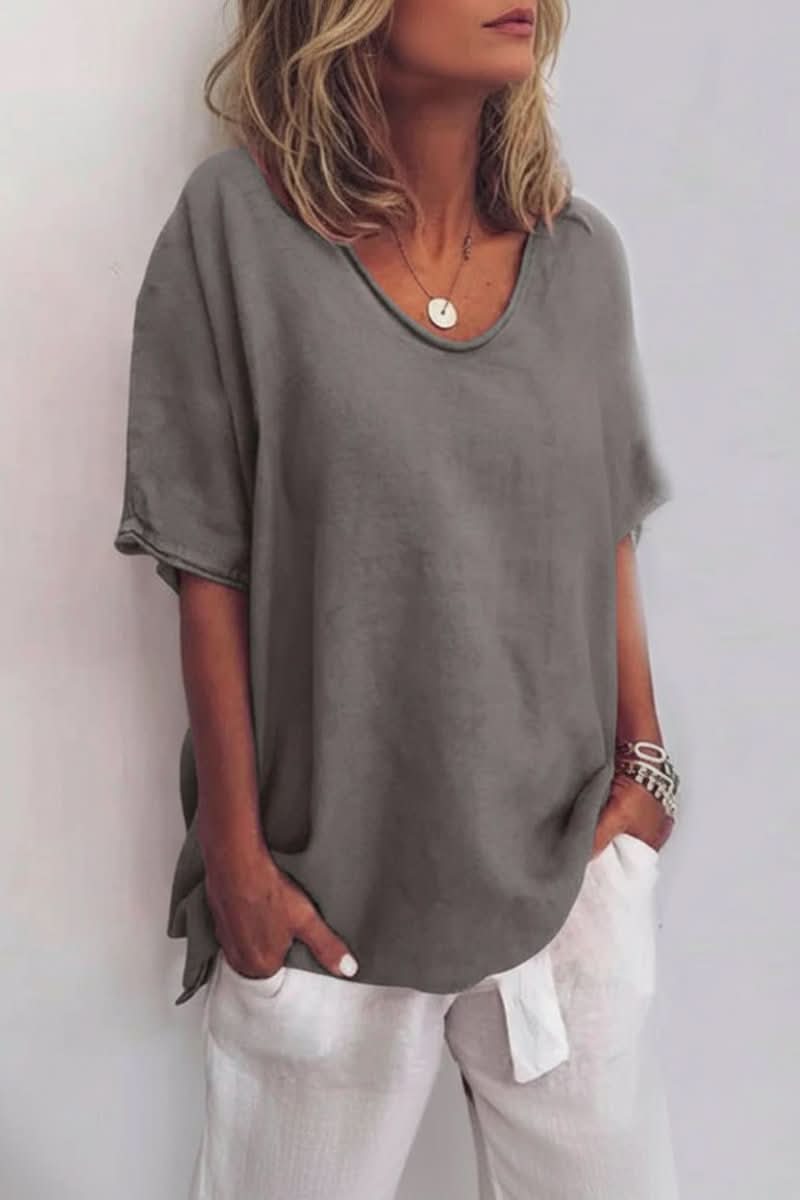 Stylish women's V-neck summer blouse, great for brunch outfits or a relaxed beach day.