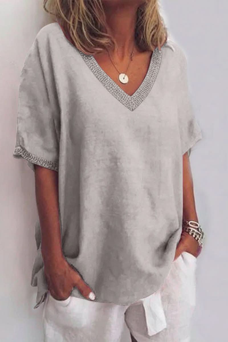 Relaxed fit women's V-neck blouse, an essential lightweight summer top for easy fashion.