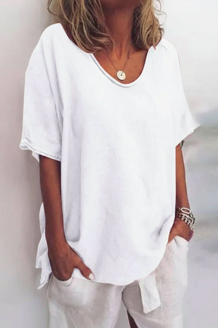 Embrace summer in this comfortable, relaxed fit V-neck women's blouse for casual wear.