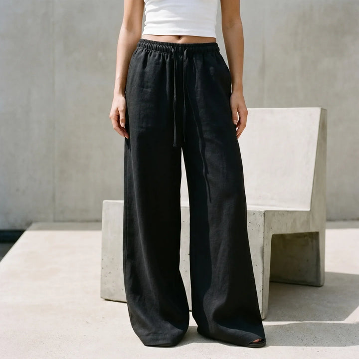 Women's relaxed fit wide-leg pants with drawstring waist, ideal for casual summer wear.