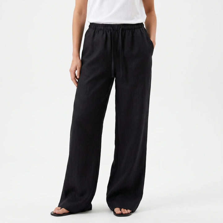 Comfortable high-waisted wide-leg pants for women, flowing silhouette perfect for everyday casual style.