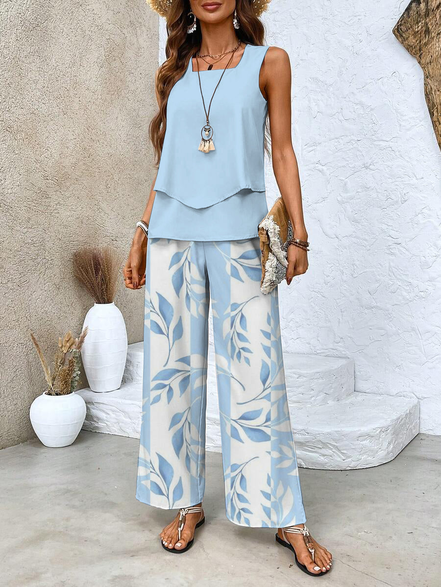 Women's relaxed flowy pants & tank top matching set. Comfortable two-piece for casual summer wear.