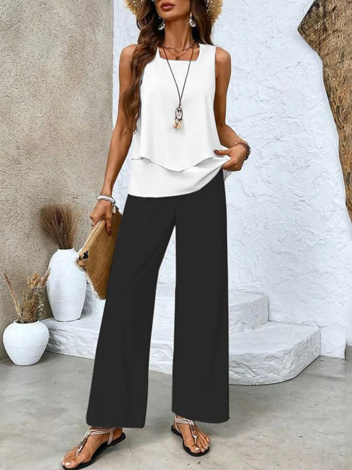 Flowy wide-leg pants & tank top matching set for women. Perfect relaxed resort wear outfit.