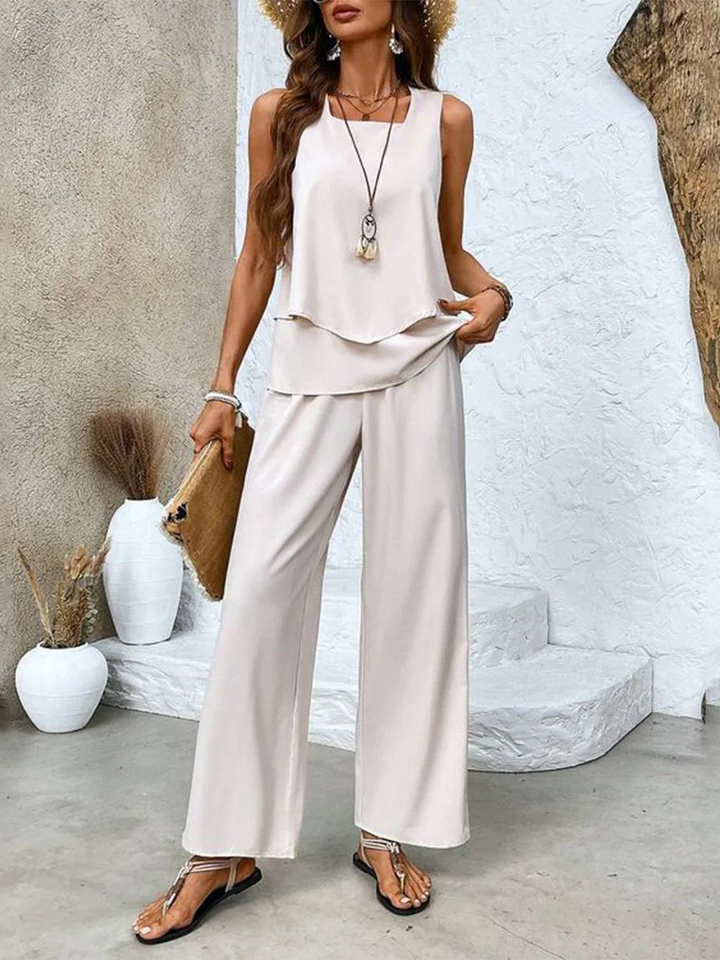 Versatile women's two-piece set featuring a relaxed tank top & flowy pants. Great for resort or casual wear.