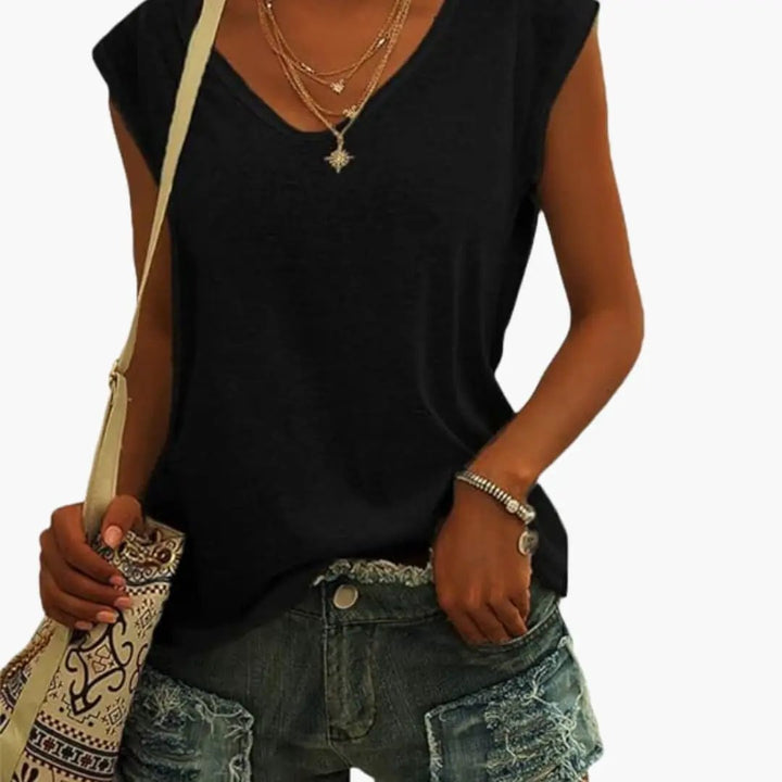 Effortless women's V-neck sleeveless top, relaxed fit for ultimate comfort and versatility.