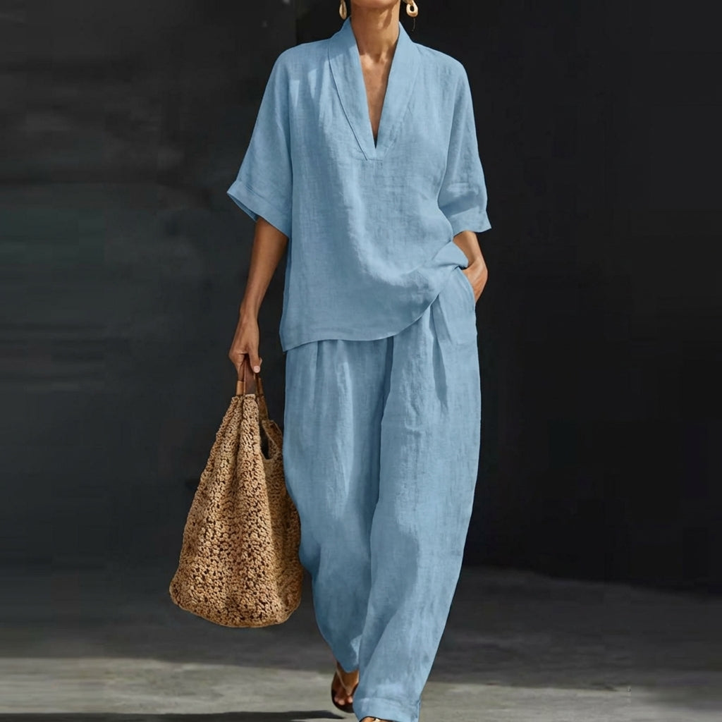Women's relaxed V-neck top & wide-leg pants two-piece set for a comfortable casual outfit.