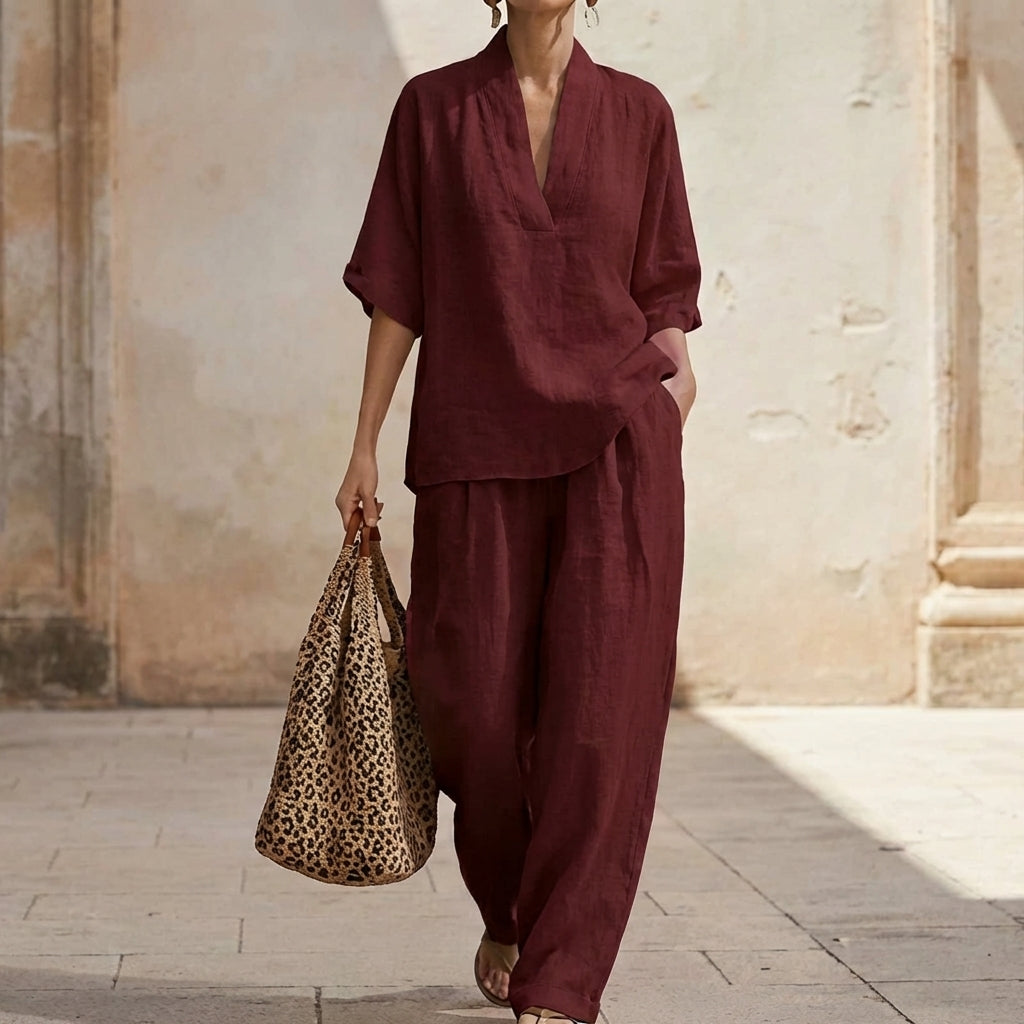 Stylish women's two-piece set: relaxed V-neck top & wide-leg pants. Perfect for lounge, travel or casual wear.