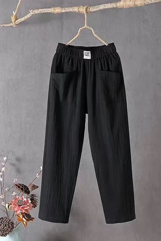 Lightweight women's wide-leg summer pants with a relaxed fit & elastic waist, great for vacation.