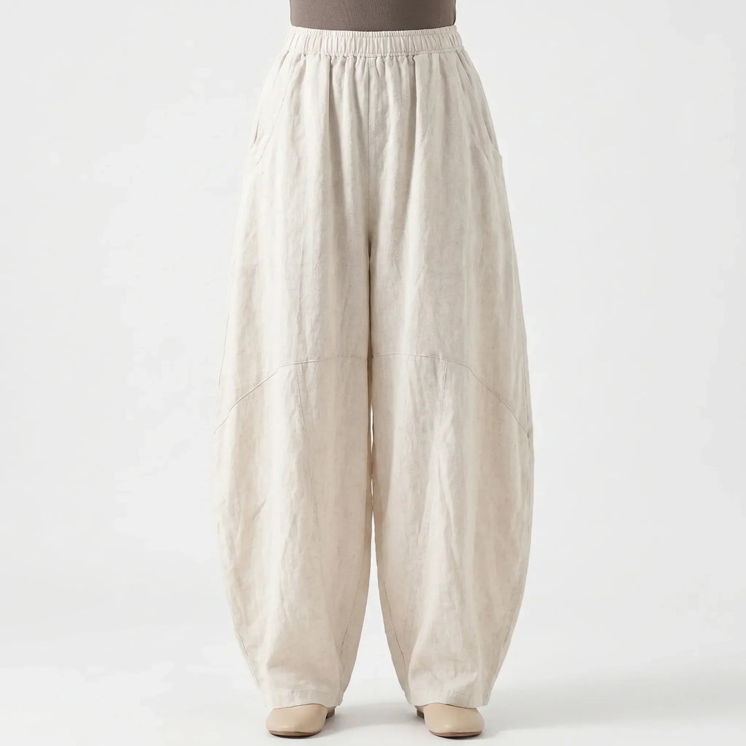 Stylish women's wide-leg trousers, relaxed fit with elastic waist, offering comfortable and chic spring/summer fashion.