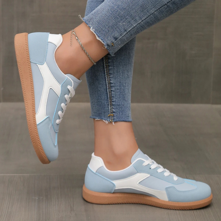Women's comfortable retro low profile sneakers, featuring a durable gum sole & cushioned design for daily use.