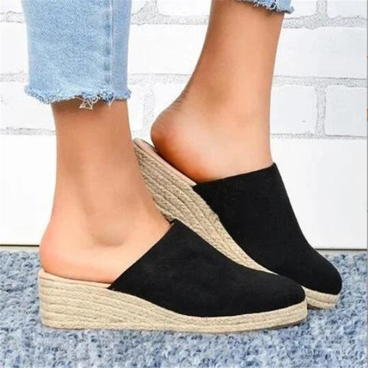 Chic women's platform wedge sandals, versatile for everyday wear and summer comfort.