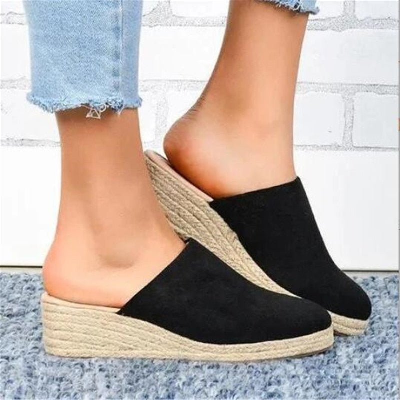 Retro chic women's sandals, featuring a comfortable wedge platform for stylish summer looks.
