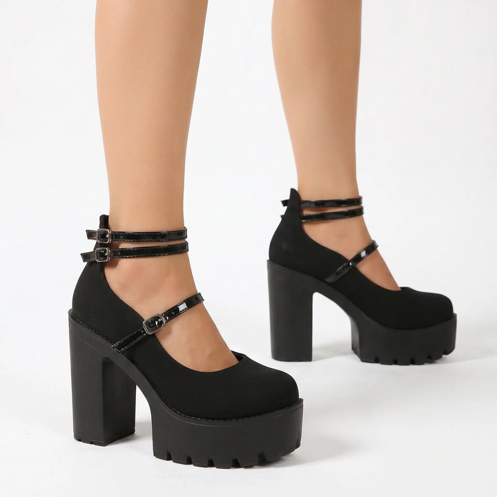 Elegant women's retro Mary Jane platform pumps featuring a chunky block heel and adjustable strap for statement style.