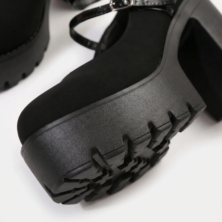 Chunky platform Mary Jane pumps for women, retro style. Adjustable strap and block heel suitable for formal or casual wear.