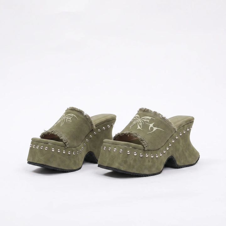 Khaki chunky platform sandals with a retro slip-on design and sturdy block heel.