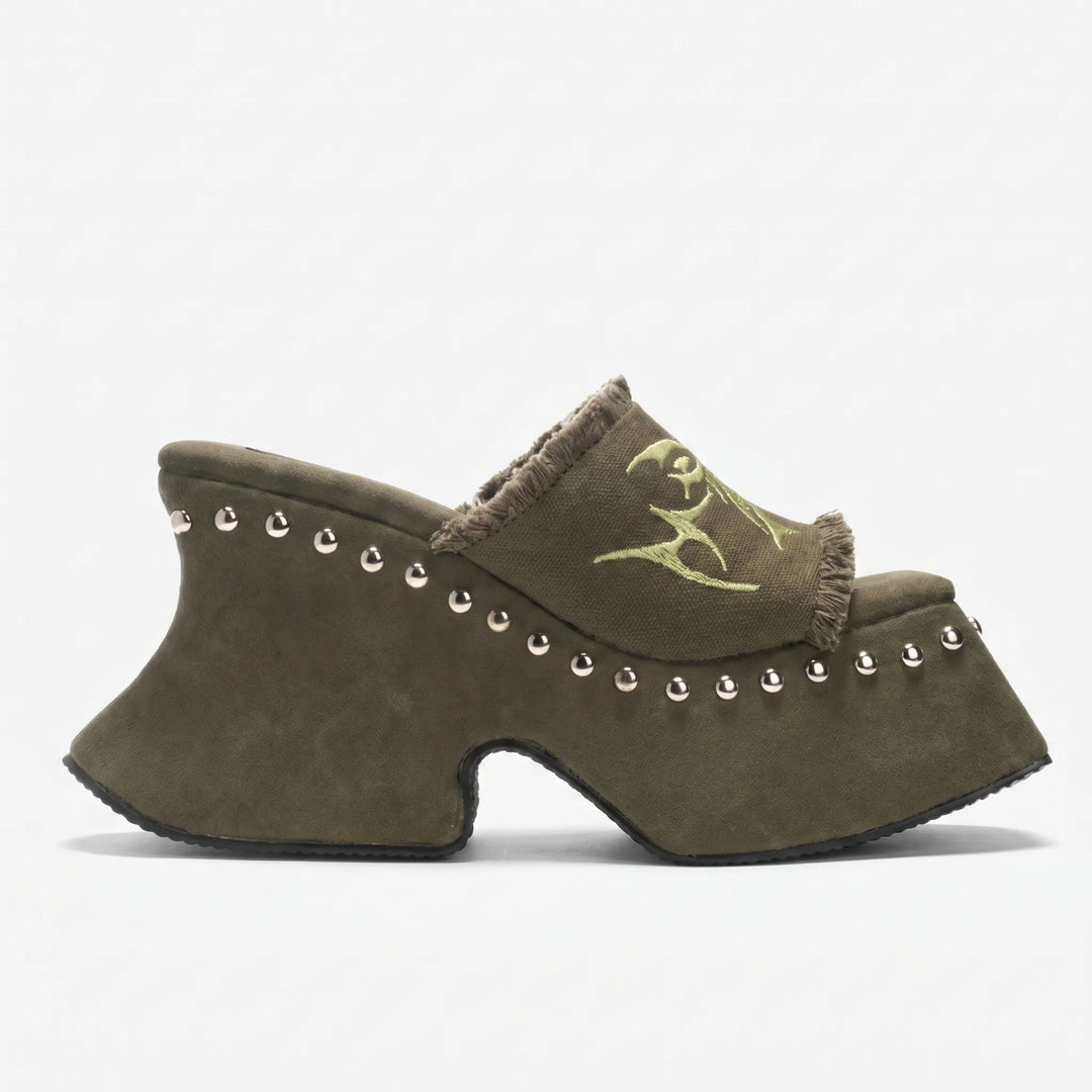 Edgy women's retro chunky platform sandals with a slip-on mule design and high block heel.