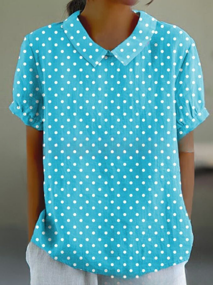 Comfortable women's short-sleeve retro floral top, embroidered, relaxed fit for summer casual.