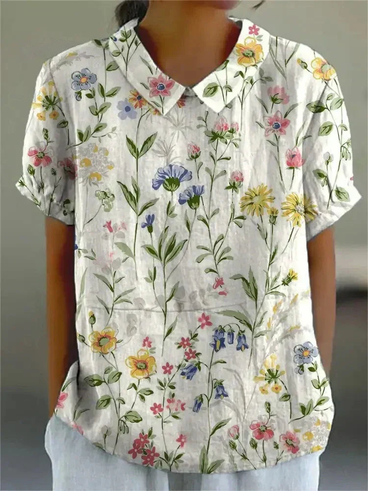 Relaxed fit women's retro floral embroidered short-sleeve top, perfect for casual chic summer.