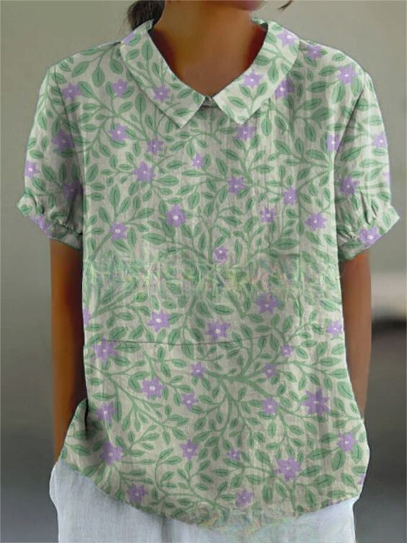 Collared women's retro floral blouse with intricate embroidery, a casual chic summer top.