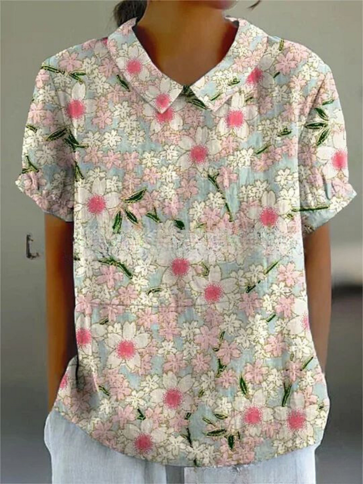 Women's retro floral embroidered short-sleeve blouse, relaxed fit, perfect for vintage style.