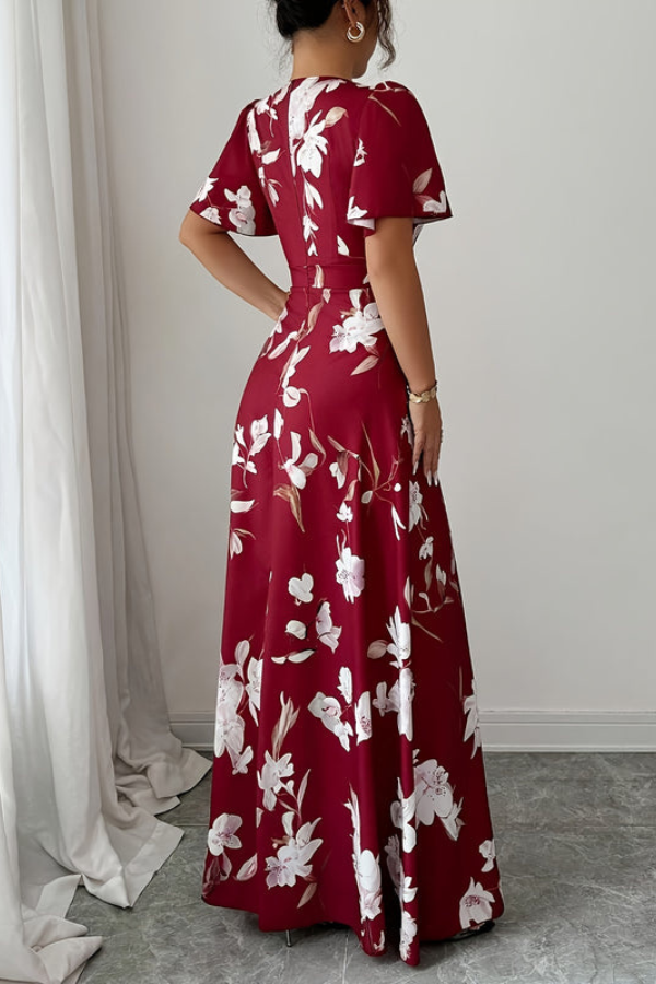 Pleated retro floral midi dress with ruffled sleeves, ideal for elegant party or vacation wear.