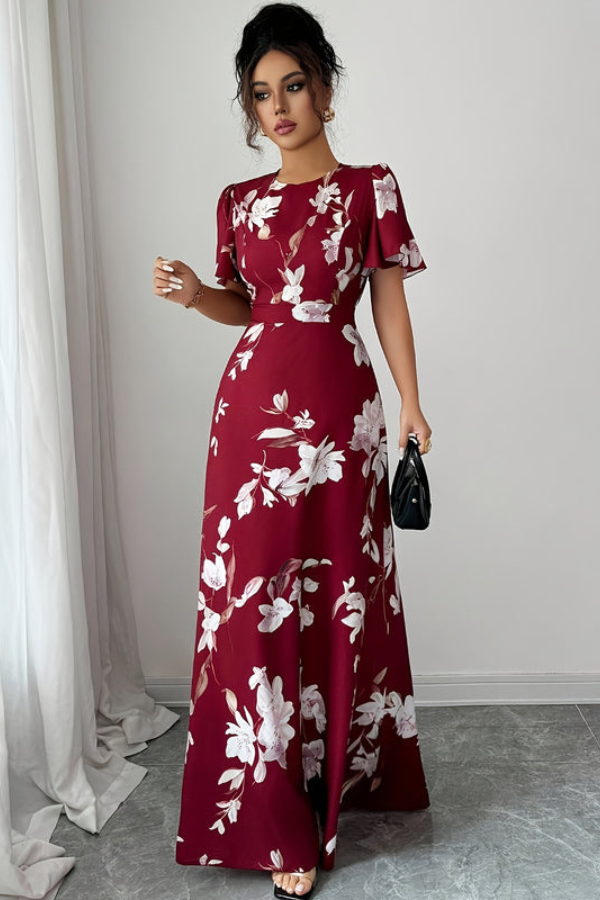Women's elegant summer midi dress, retro floral print, pleated skirt, and ruffled sleeves.