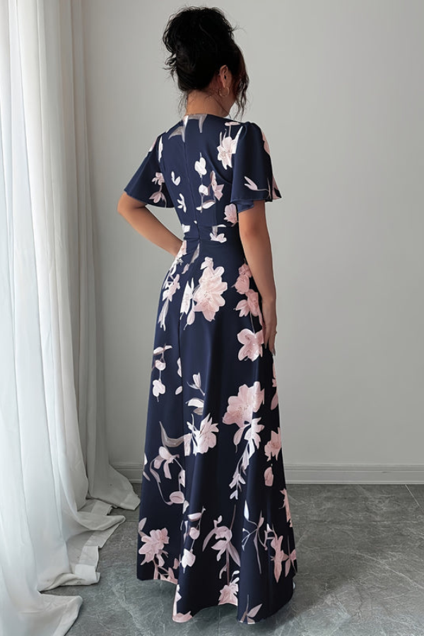 Elegant A-line midi dress for women, retro floral pattern, pleated details, and ruffled sleeves.
