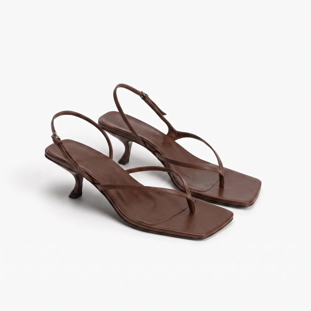 Comfortable women's retro kitten heel sandals. Stylish square toe and adjustable strap for elegant summer wear.