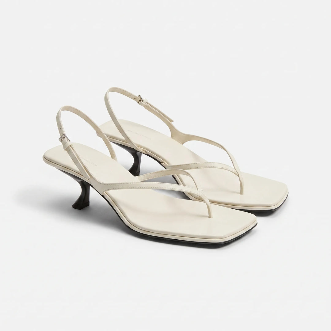 Elegant retro square toe kitten heel sandals for women. Features a chic slingback and comfortable design.