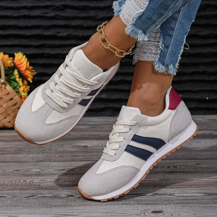 Versatile women's casual lace-up sneakers with retro stripes & colourblock design, perfect for everyday & street fashion.