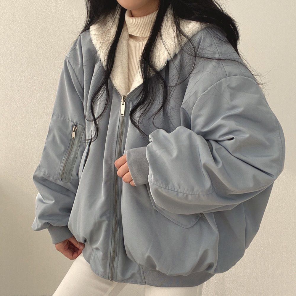 Women's reversible hooded jacket, cozy & versatile, perfect fall/winter layering piece.