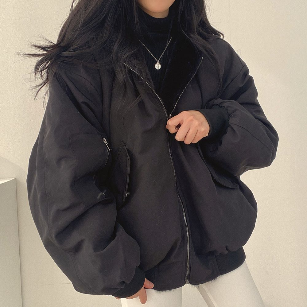 Warm women's reversible hooded jacket, an essential piece for cold weather and versatile fashion.
