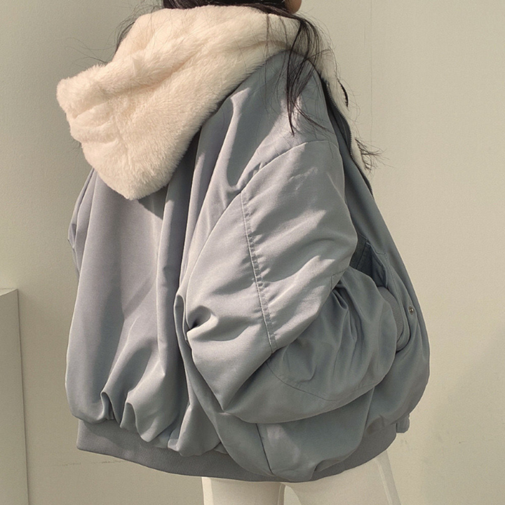 Front view: women's cozy reversible hooded jacket, ideal for casual fall fashion outerwear.