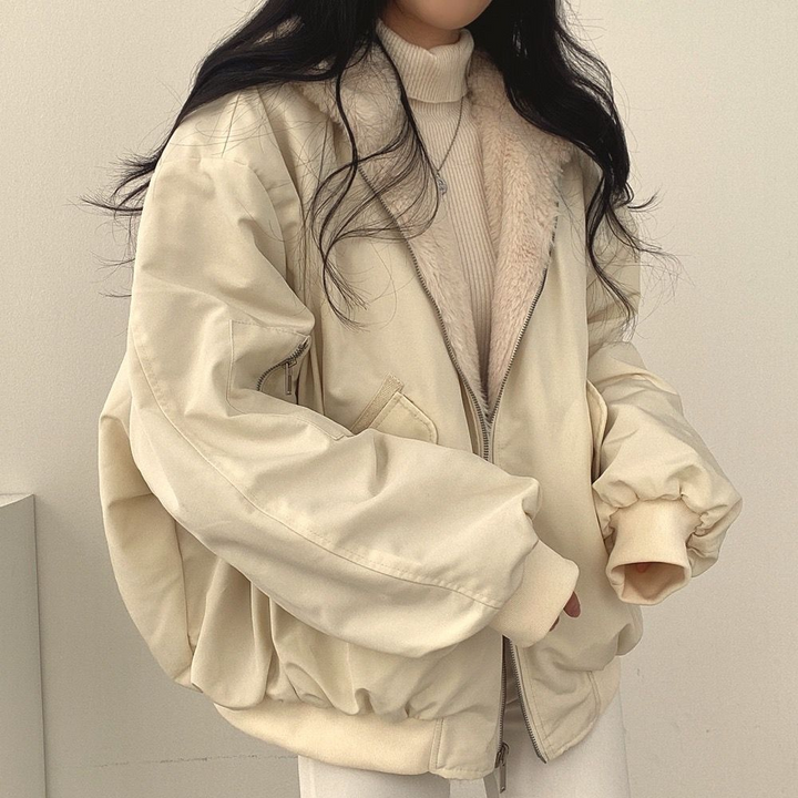 Stylish women's reversible hooded jacket, warm layering piece for cold fall & winter weather.
