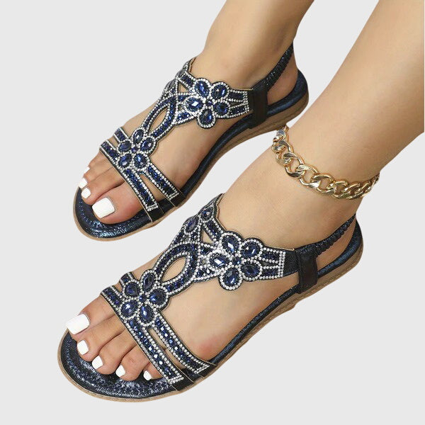 Women's rhinestone boho flat sandals for summer glamour and comfort.