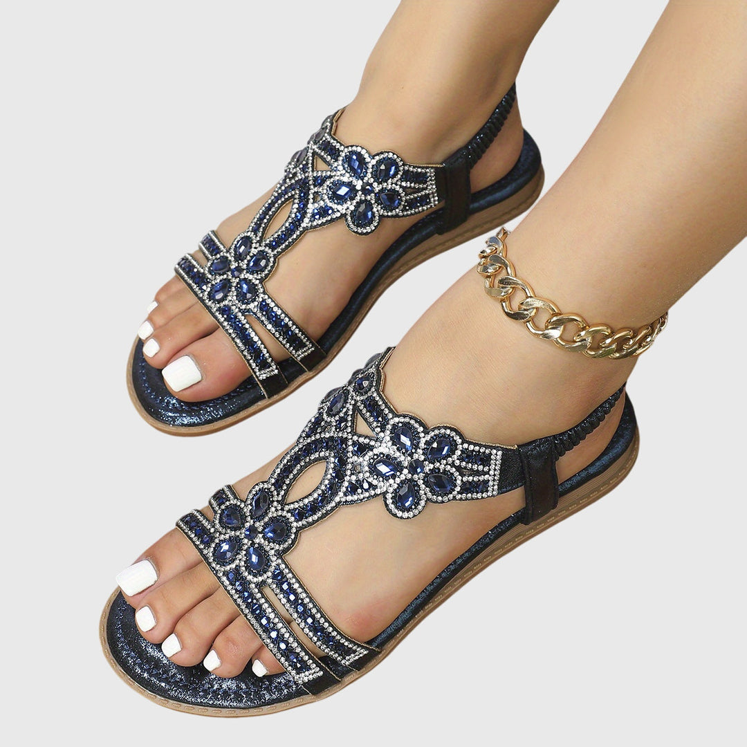 Resort fashion women's flat sandals, sparkling with clear rhinestones.