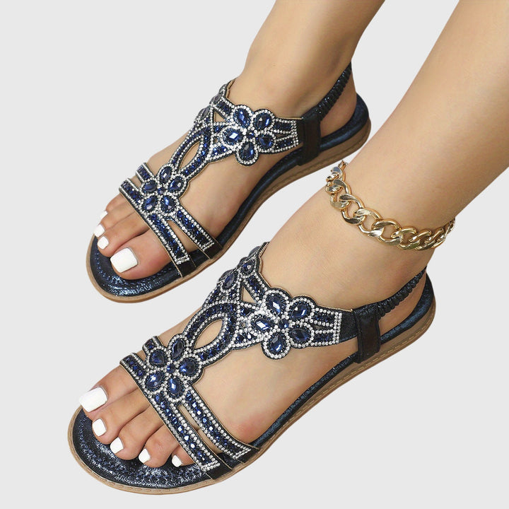 Comfortable women's slip-on sandals, boho-style with delicate rhinestone details.