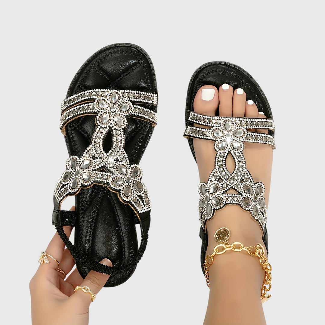 Women's rhinestone flat sandals for a trendy boho summer look.
