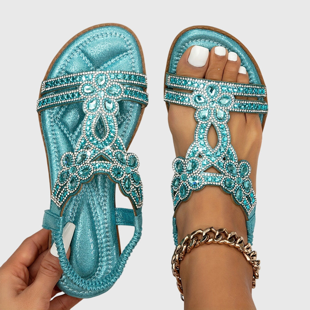Rhinestone embellished boho flat sandals for women's ultimate summer style.