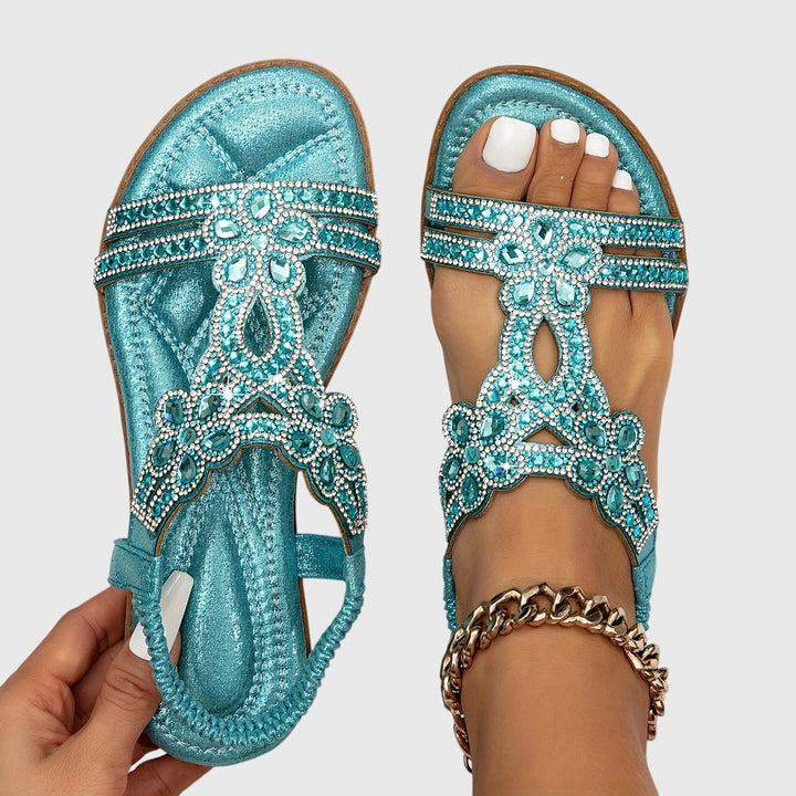 Rhinestone embellished boho flat sandals for women's ultimate summer style.