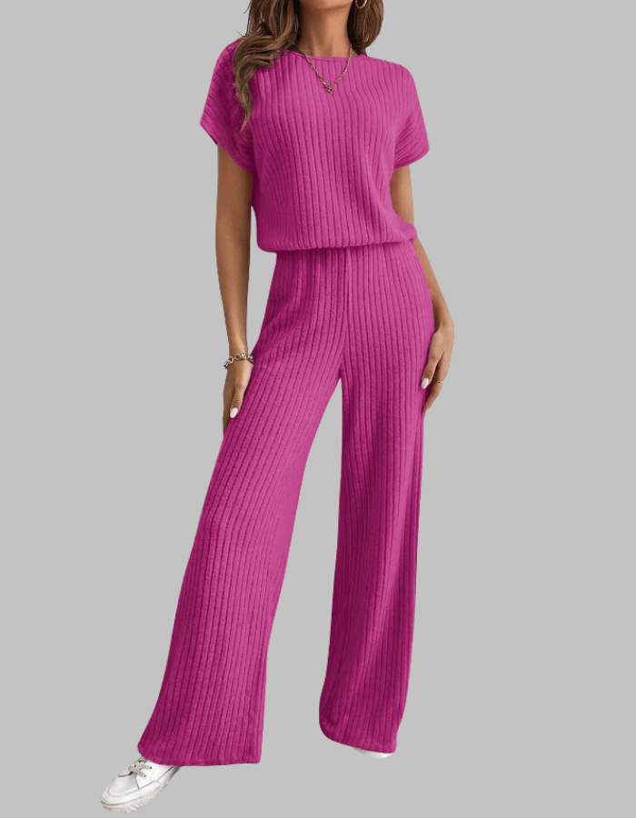 Comfortable women's ribbed knit two-piece set. Features a short sleeve top and stylish wide-leg lounge pants.