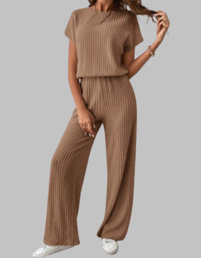 Relaxed fit women's ribbed two-piece lounge set. Soft short sleeve top & comfy wide-leg pants for everyday wear.