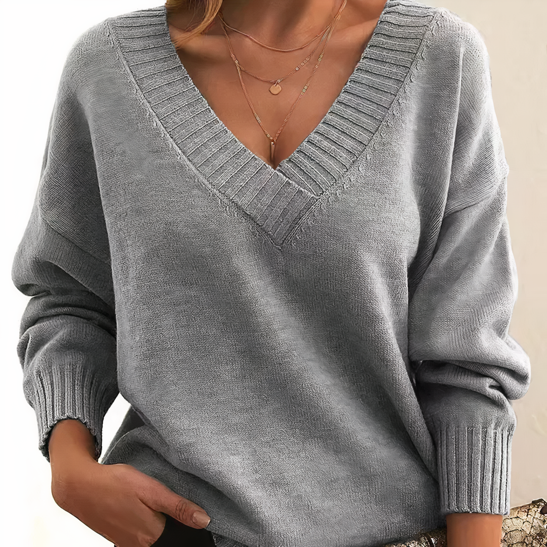 Versatile women's ribbed v-neck long sleeve sweater. Relaxed fit, great for casual fall/winter looks.