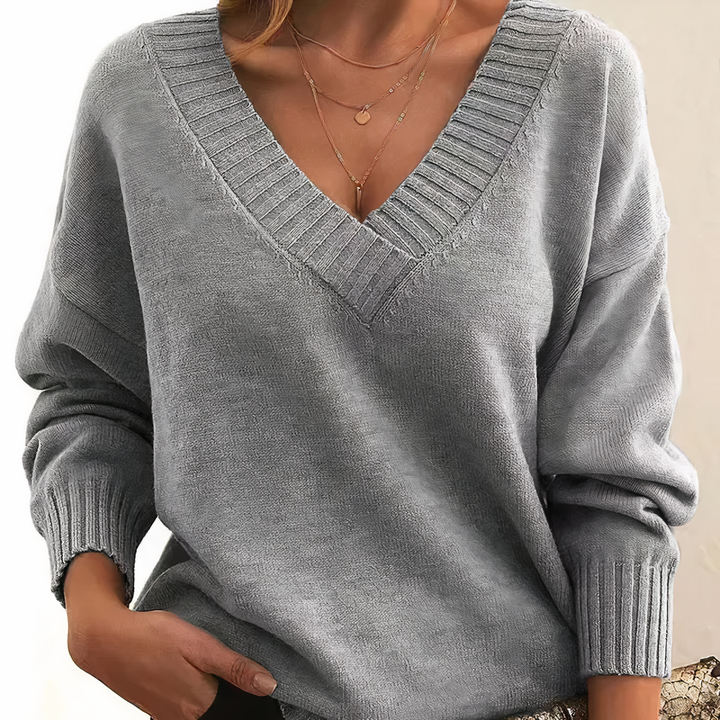 Versatile women's ribbed v-neck long sleeve sweater. Relaxed fit, great for casual fall/winter looks.