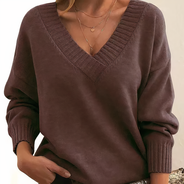 Textured women's ribbed v-neck sweater. Relaxed fit long sleeve, cozy for fall & winter casual fashion.
