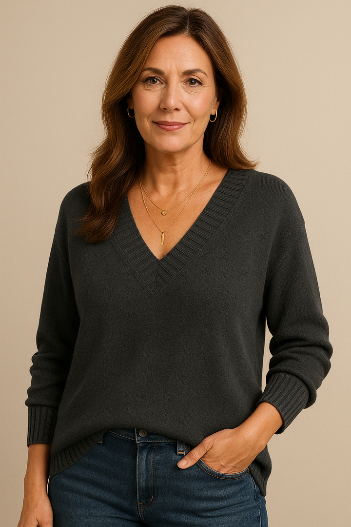 Warm women's ribbed v-neck sweater. Relaxed fit long sleeve for cozy fall/winter everyday comfort.