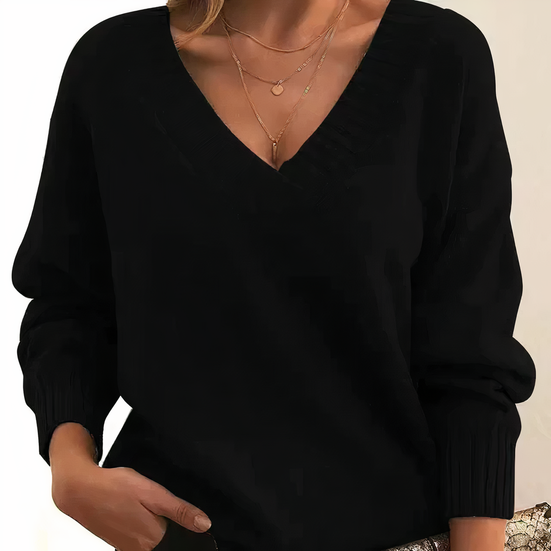Women's ribbed v-neck long sleeve sweater. Relaxed fit for everyday casual wear & winter fashion.
